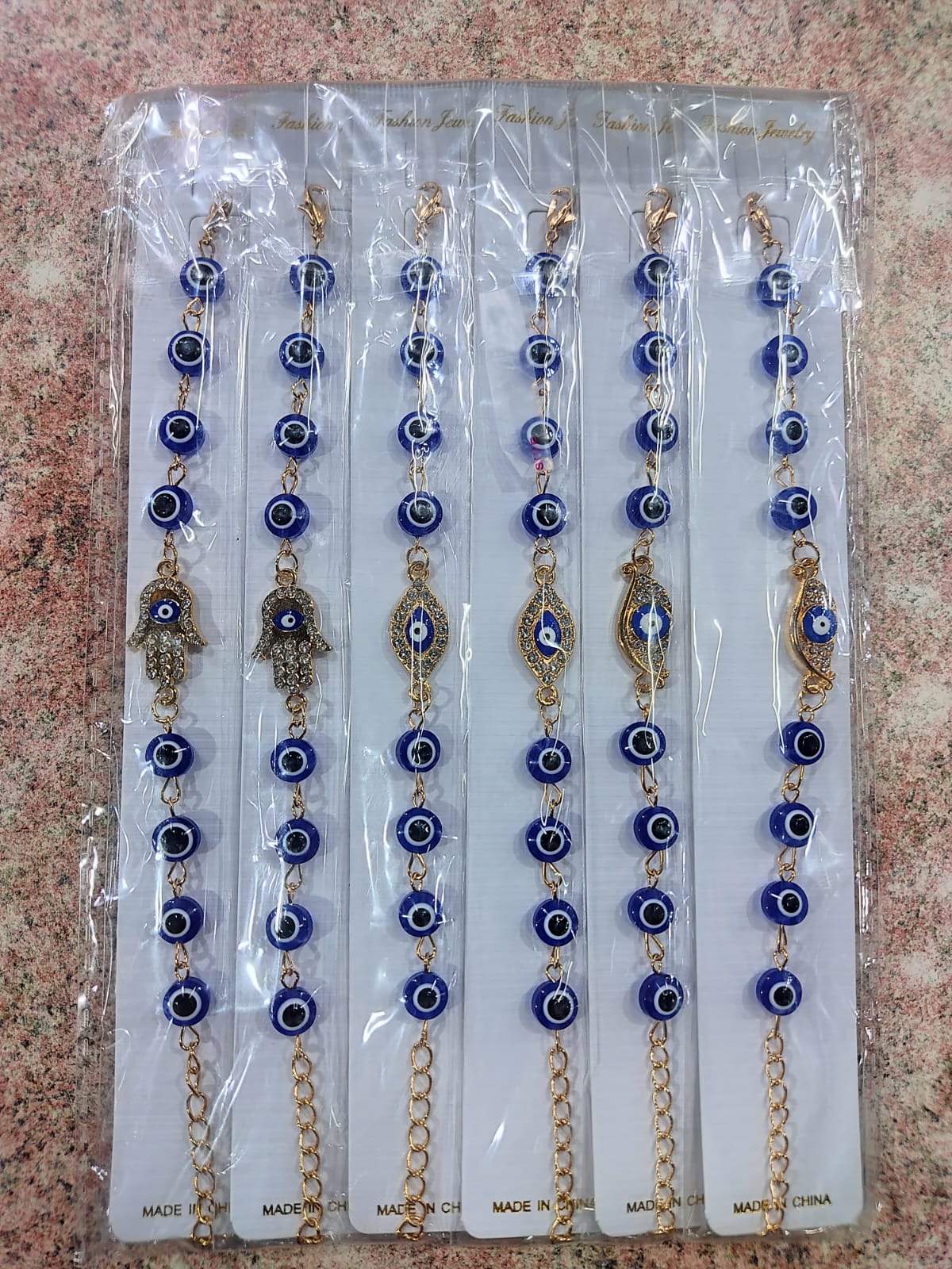 💛✨ PULSERAS DORADAS CON OJO AZUL Y DIJES CON STRASS 💎✨