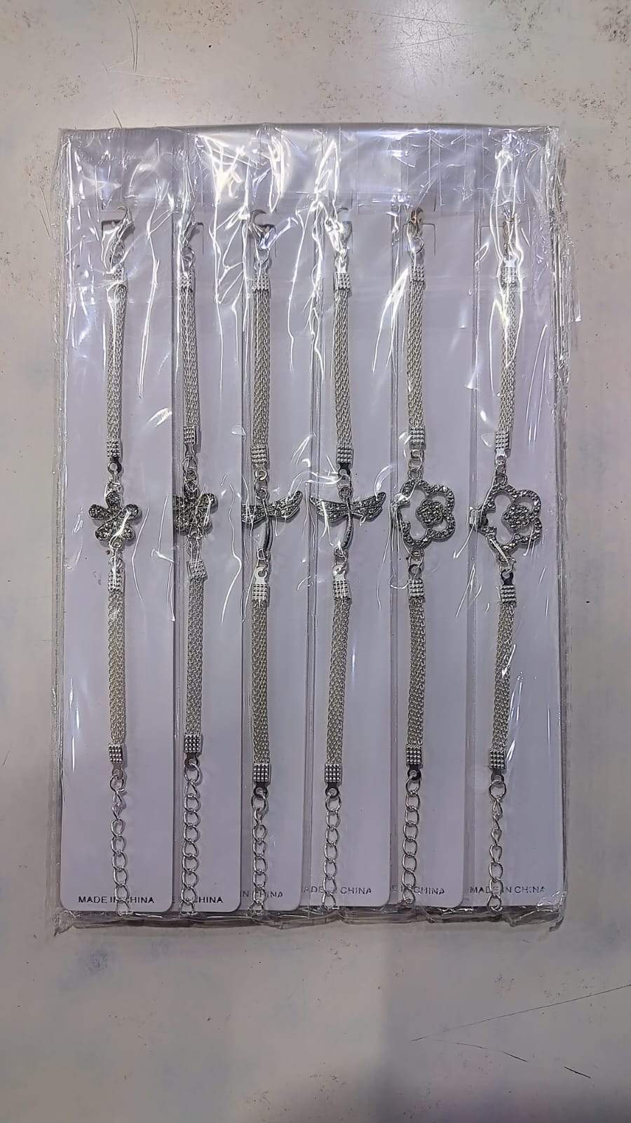 ✨ Pulseras x12 con Dijes Surtidos ✨